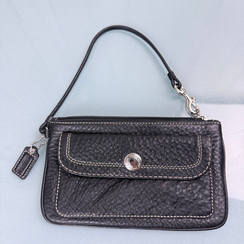 Coach Clutch Wingslet Black Bag Zippered /Snap Closure Excellent condition